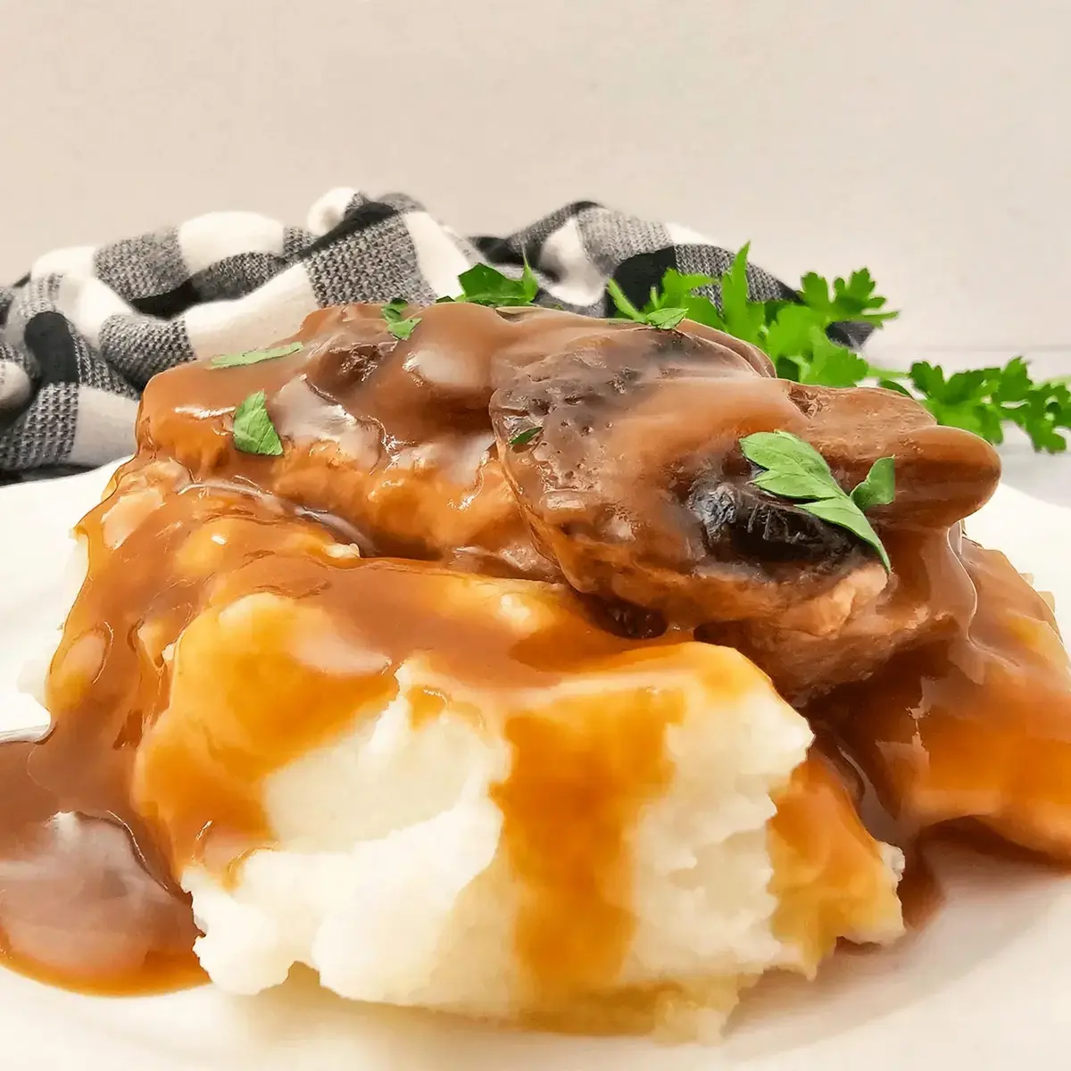 15 Family-Friendly Crockpot Dinners Kids Will Love for Easy Weeknights 6 15 Family-Friendly Crockpot Dinners, Crockpot Brown Gravy Smothered Pork Chops