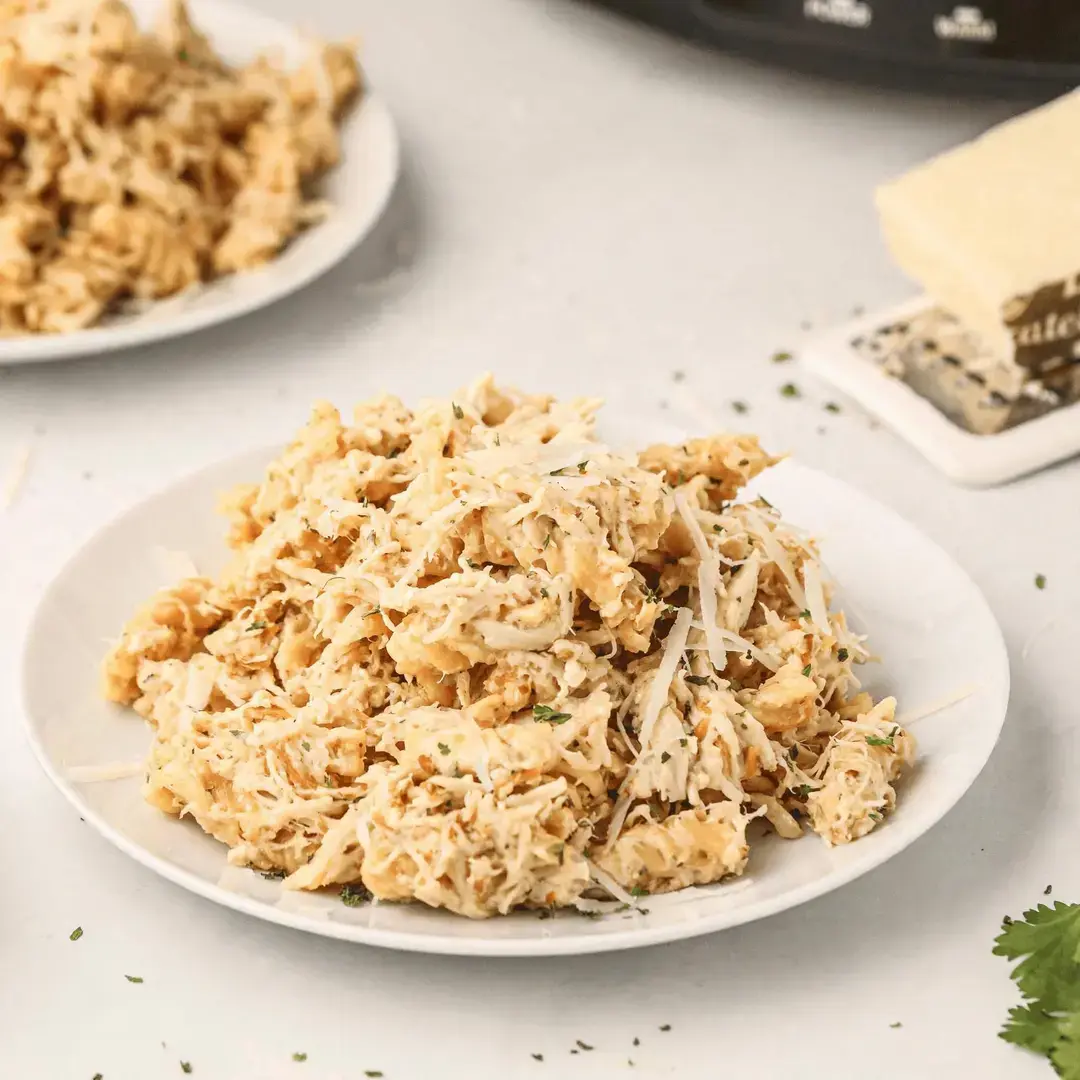 15 Family-Friendly Crockpot Dinners Kids Will Love for Easy Weeknights 9 15 Family-Friendly Crockpot Dinners, Crockpot Garlic Parmesan Chicken Pasta (Buffalo Wild Wings)