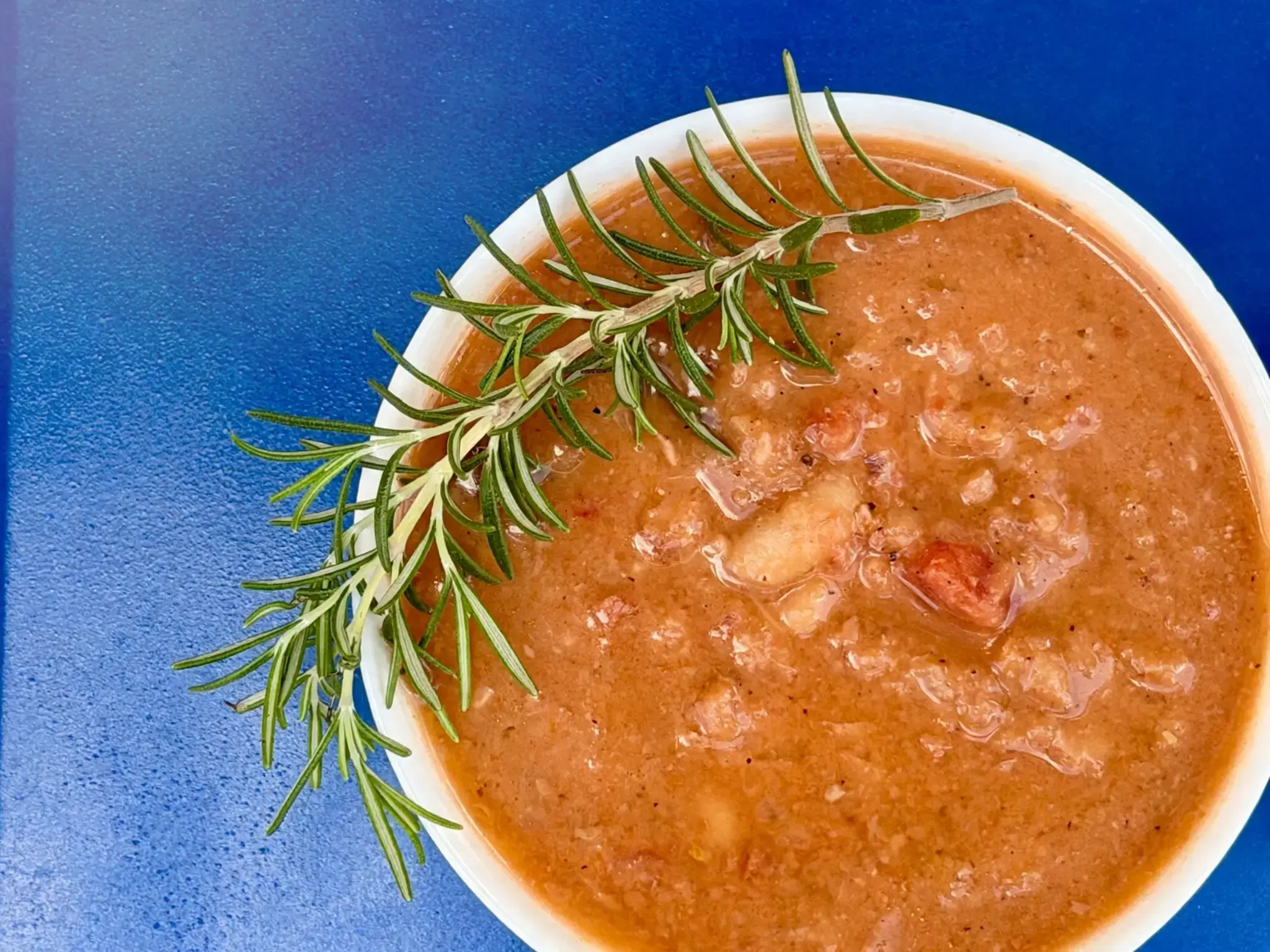 26 Fall Crockpot Dinners to Cook All Season Long 8 26 Fall Crockpot Dinners, 8) Slow Cooker White Bean and Rosemary Stew