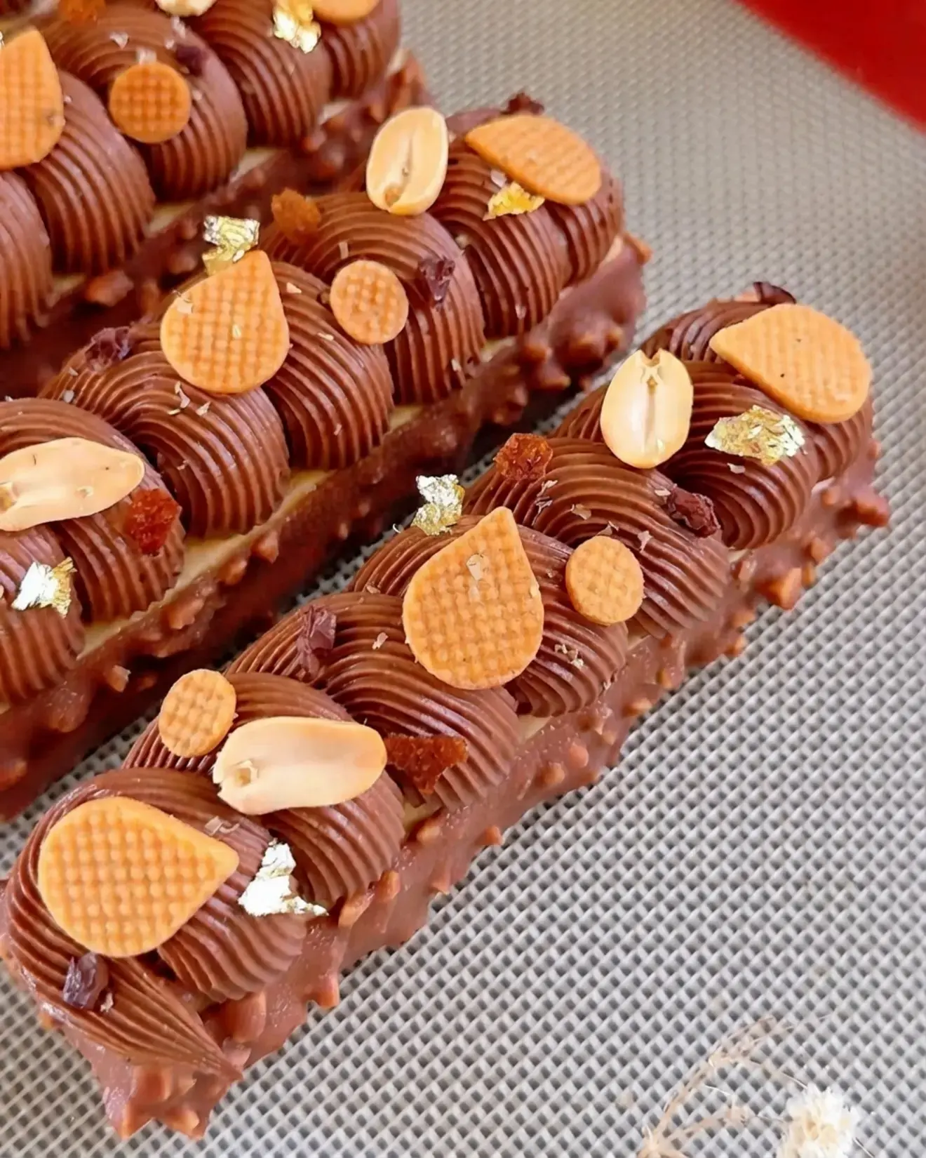 Peanut Butter Chocolate Caramel Bar: A Layered Pastry Dessert 11 Peanut Butter Chocolate Caramel Bar, With chocolate feuilletine, dacquoise, salted caramel, peanut butter mousse, chocolate whipped ganache, and rocher glaze